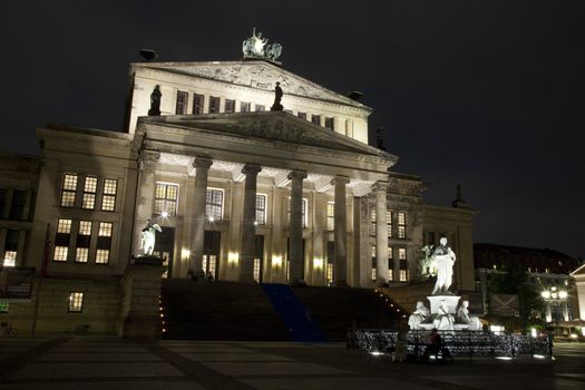 A night view of the Konzerthaus and the statue of German poet Friedrich Schiller in Berlin.