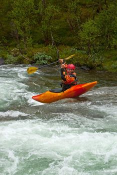 Kayak trip on the waterfalls in Norway. July 2010