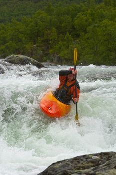 Kayak trip on the waterfalls in Norway. July 2010