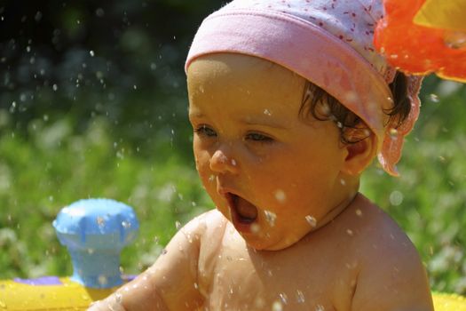 young girl have fun in the water