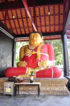 Large sitting buddha with red in Chiang Mai, Thailand