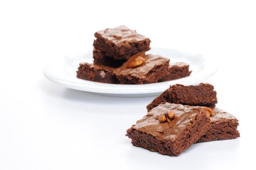 Fresh baked brownies shot on a white background.