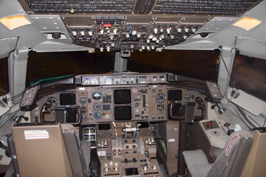 cockpit of a commercial passenger airliner without pilots