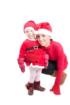 Santa mother and daughter in studio isolated