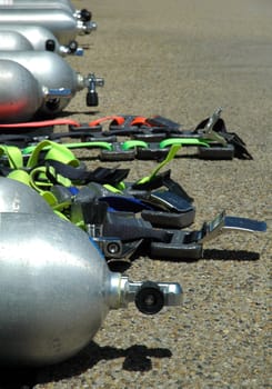 diving equipement, air cylinders, weight belts, distance blurring