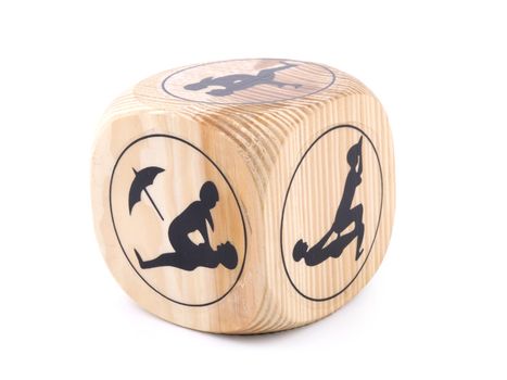 Erotic wooden cube on white background