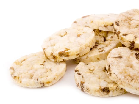 Closeup picture of small rice cakes on white background