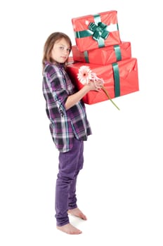 Teenager girl with presents in studio isolated on white