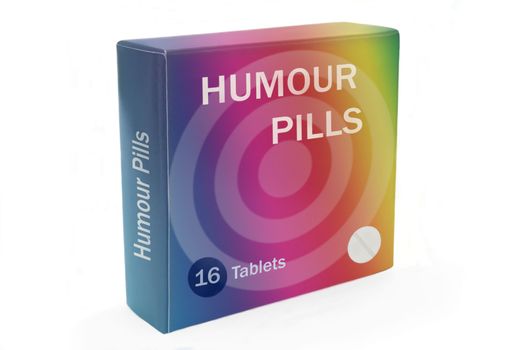 Close and low level angle capturing a multicoloured medication pack with the words "Humour Pills" arranged over white.