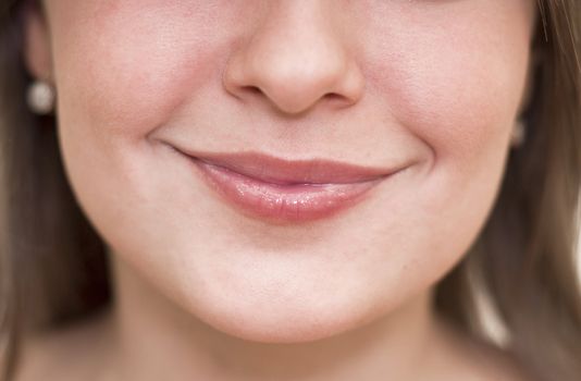 Beautiful women lips closeup. Emotion on his face.