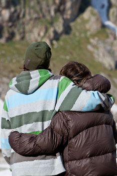 Couple in the mountains during summer vacations. Caucasus, 2010