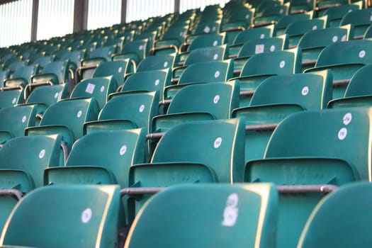 Rows of empty seats in a grandstand