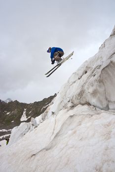 Freerider, jumping in a mountains, Caucasus, summer, 2010