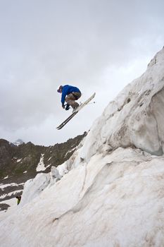 Freerider, jumping in a mountains, Caucasus, summer, 2010