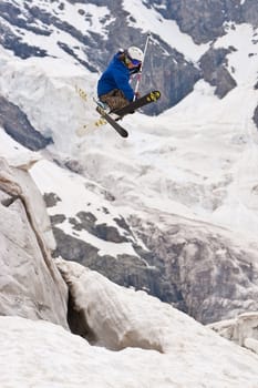 Freerider, jumping in a mountains, Caucasus, summer, 2010