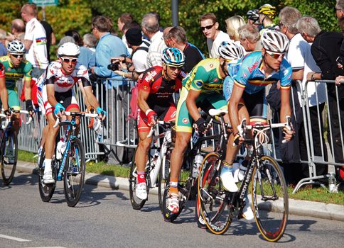 COPENHAGEN - SEPTEMBER 25: Unknown international elite cyclists at 2011 UCI road race championships in Rudersdal. The event starts on September 19 - 25, 2011 in Copenhagen and Rudersdal, Denmark.