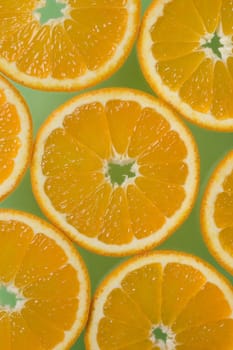 orange slices on the green background