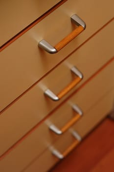 kitchen cupboard with wooden drawers