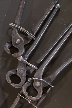 naildrawer on the scratched steel workshop table 