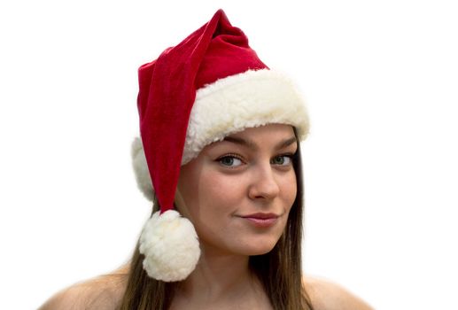 Young women in a Santa Claus hat. Studio shot, isolation on a white background
