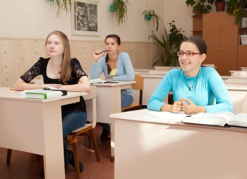 Schoolgirls in class in a classroom