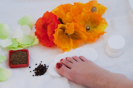 Woman taking care of her feet
