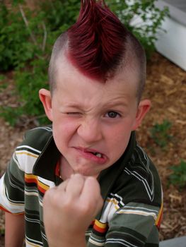 Punk kid making a fist