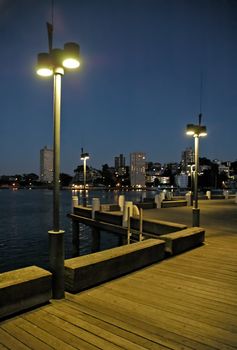 wooden wharf in night, street lights, Sydney