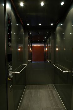 open stainless elevator with mirror, i had to erase myself ...