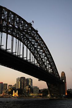 dusk photo of Harbour Bridge; location: The Rocks, Sydney; circus in background