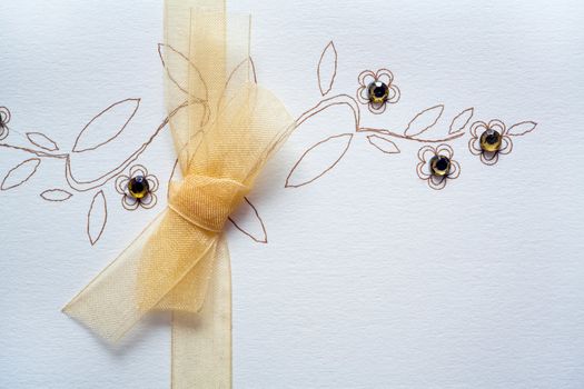 Wedding greetings ornament with bow, drawing and jewelery
