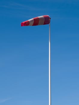 Airport windsock indicating the wind direction - vertical image