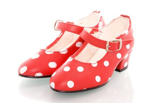 a pair of red dotted spanish shoes