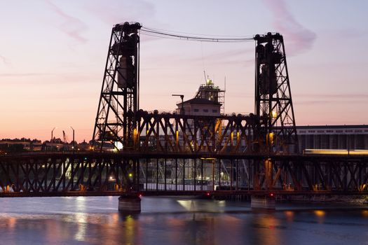 Steel Bridge over Willamette River in Portland Oregon at Sunset