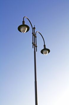 Street lamp isolated on blue sky