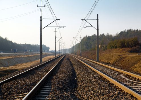 Electrified railroad track across the countryside
