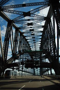 no traffic on Harbour bridge during Sydney marathon, runners and train in picture, bridge silhouette