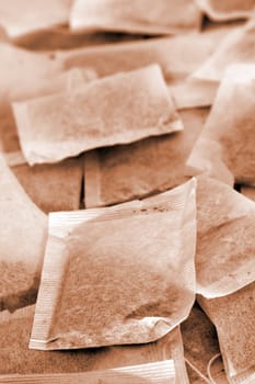 several tea bags, colorized in brown color