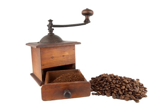 Traditional coffee grinder with its drawer