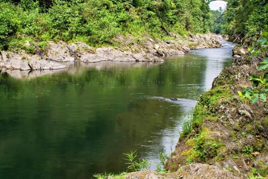 This is the bottom of Quechee Gorge in Quechee, Vermont. The river flowing through this gorge is the Ottauquechee River.