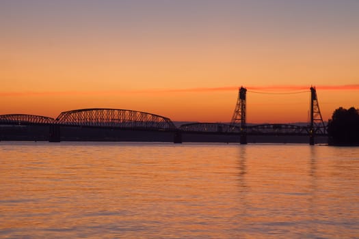 Silhouette of Columbia River Crossing I-5 Intertstate Bridge at Sunset
