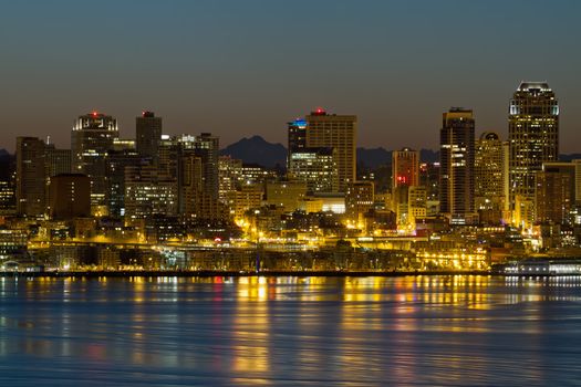 Seattle Washington Waterfront Skyline and Mountain Range at Dawn