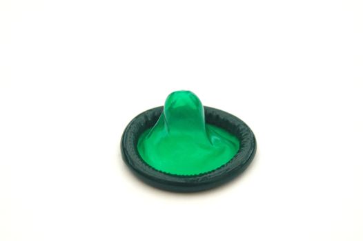 Bright Green Condom on White Background