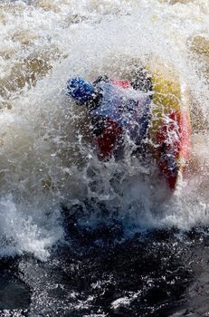 Kayak freestyle on whitewater