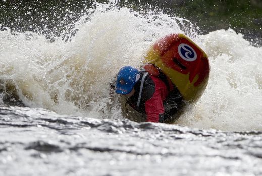 Kayak freestyle on whitewater