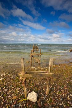 Abandoned Jetty heading out to sea in Denmark