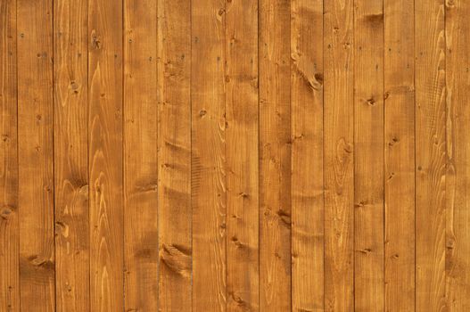 Close up of orange colored wooden boards background