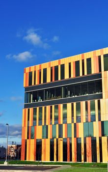 Superb modern architecture of new office building on street corner.