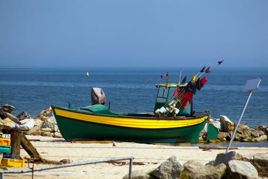 Wooden boat on the seashore
