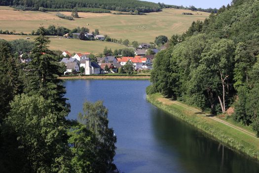 Helminghausen seen from the dam at lake diemelsee, hessen, germany